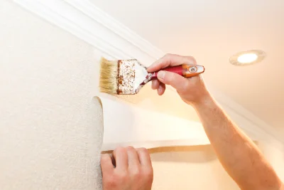 Pose de papier peint à Quézac — revêtements muraux et toiles de verre